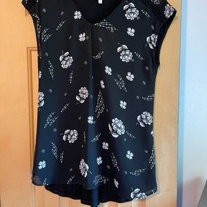 Sleeveless black blouse
